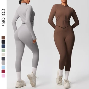 Wholesale Quick Dry Long Sleeve Top with Zipper Active Wear Gym Leggings with Pockets Yoga Set for Women