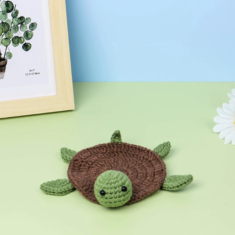 Crochet but make it adorable 🐢💛, This turtle coaster is not only useful but also such a cute little decorative piece for your desk or table., And yes, there’s a full tutorial on my YouTube channel so