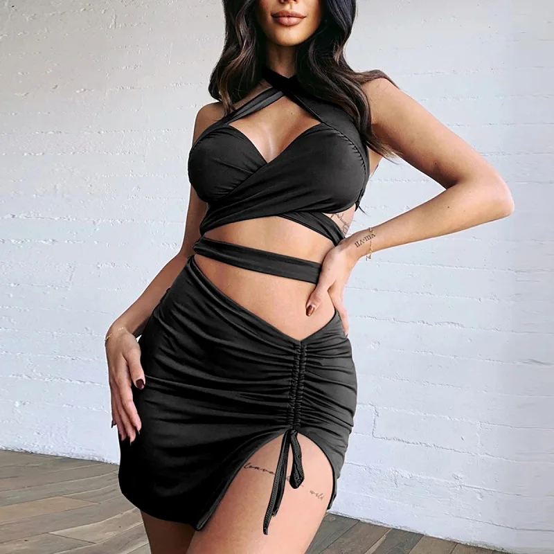 Women Backless Bodycon Two Piece Skirt Set Suits 2 Pieces Cross Halter Bandage Tops and Side Split Pleated Short Skirt Sets