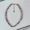 5    Mixed Color Flying Disc Necklace