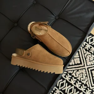 High-quality New Fashion Half Drag Female Sheepskin Thick Sole Sandals Couple Shoes Winter Anti-Slippery Slippers