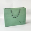Bolsa de papel de lujo con diseño personalizado y logotipo impreso para regalos y compras