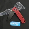 Black blade with a red handle