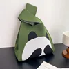 Handbag with eye-covering panda-green