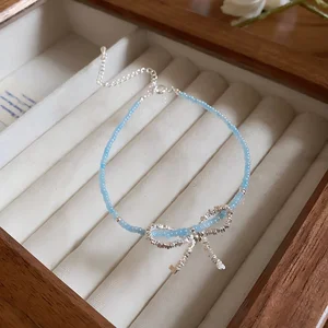 Elegant Light Blue Beaded Bracelet with Silver Bow Charm Dainty Handmade Jewelry for Women Daily Wear Gift