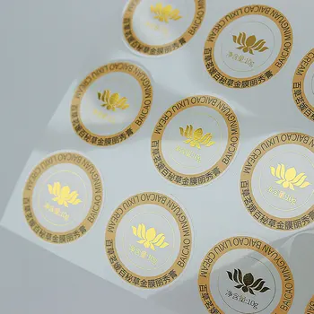 Factory customized printing logo waterproof gold foil cosmetics transparent Bopp label customized text logo transparent sticker