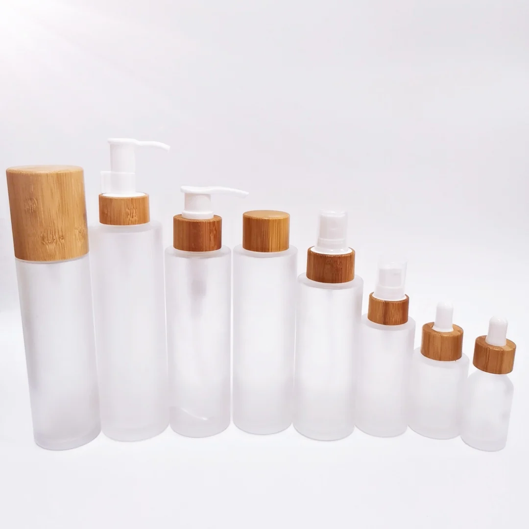 Eco Friendly 20ml Empty Round Liquid Packaging Container Frosted Glass Packaging Spray Bottle With Bamboo Pump Sprayer