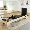 Brown oak pilates reformer