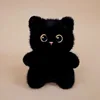 Seated palm-sized black cat-15 cm