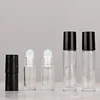Clear bottle + glass ball + black plastic cap