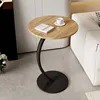 Fond rond noir, aspect bois.