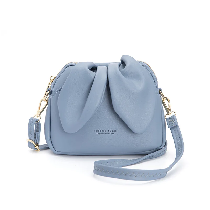 light blue bucket bolsa