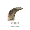 Small mixed-color cow horn
