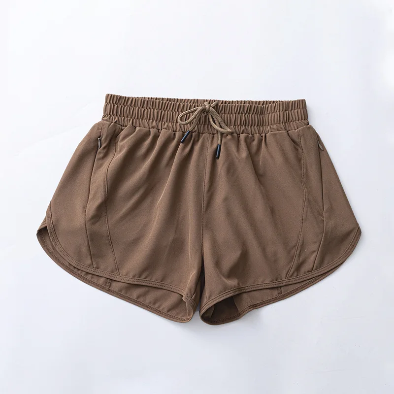 Women's Quick Dry Solid Print Fitness Shorts Outdoor Loose Waist with Hidden Pockets Made of Comfortable Spandex/Nylon
