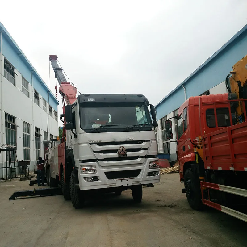 SINOTROK HOWO 8*4 LHD RHD Heavy Duty Emergency Vehicle Road Rescue Truck Rotator Wrecker Towing Truck Manufacturer