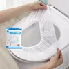 White toilet seat cover, individually packaged.