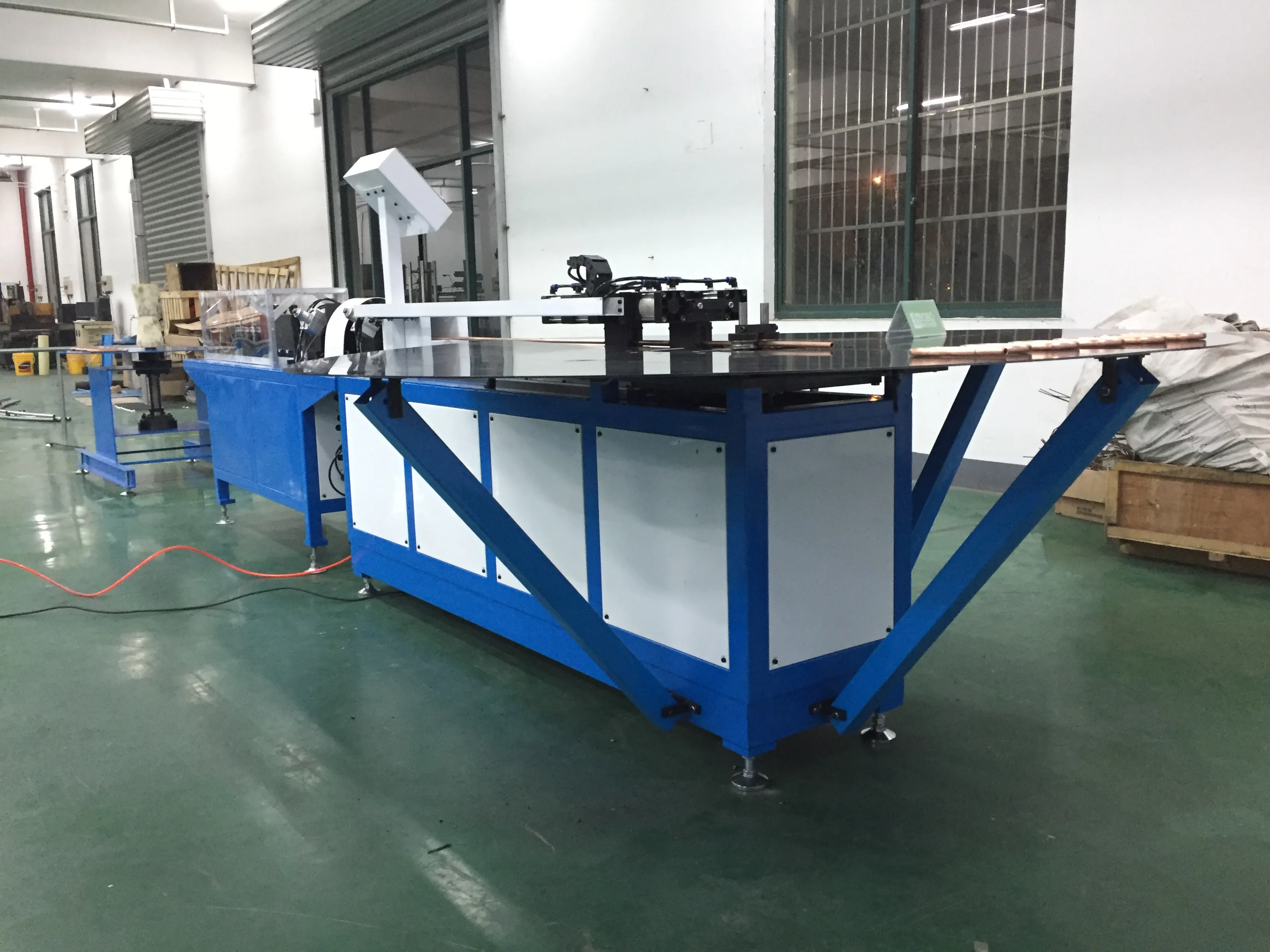 BOBO Machine heat exchanger copper bundy tube straightening cutting and shown in a detail photo for this news article