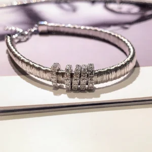 GIA-certified laboratory-grown 1.485 carat round diamond, 18 carat white gold woven ladies' bracelet, suitable for party wear.