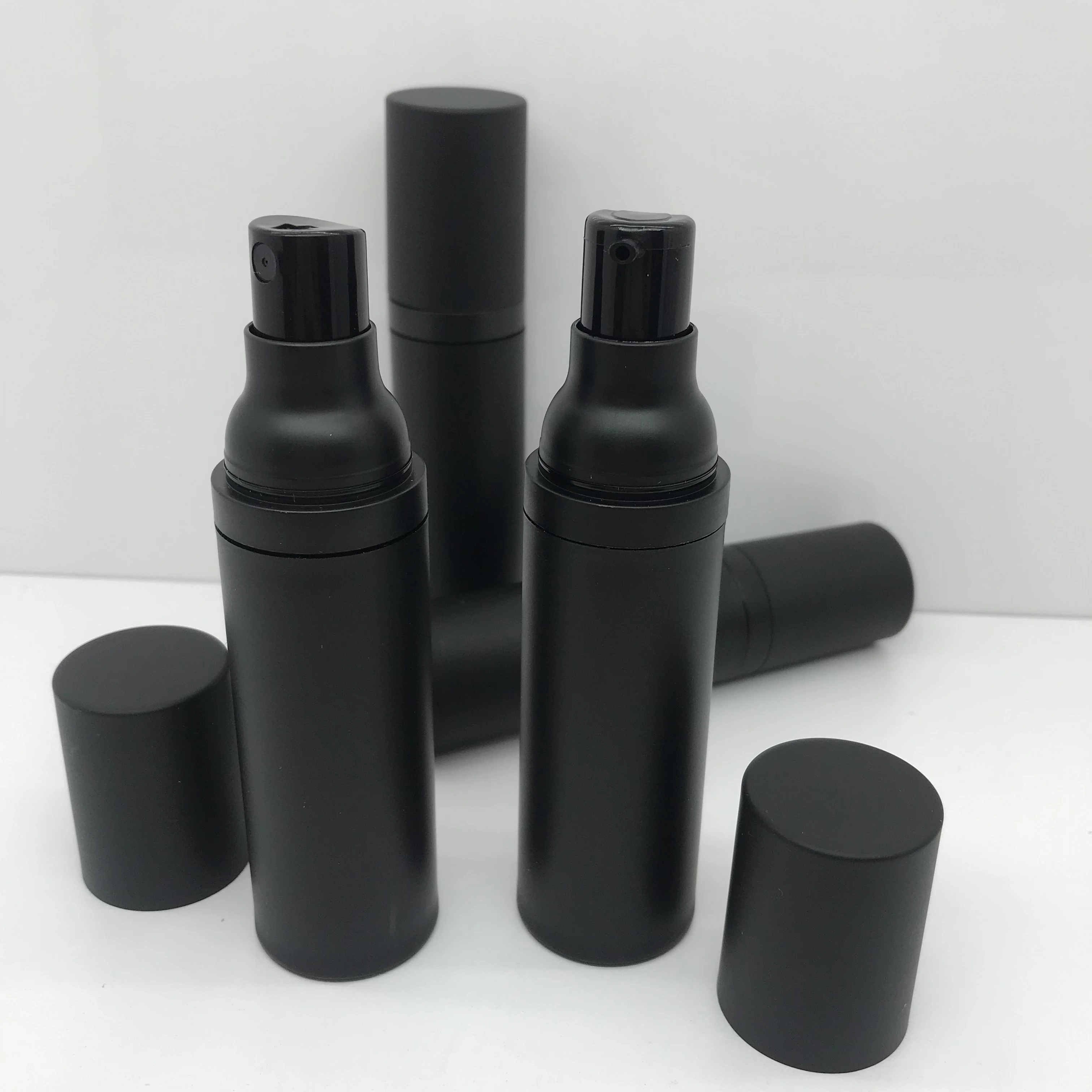 New design 15ml 20ml 30ml 50ml matte black airless lotion pump bottle airless fine mist sprayer bottle