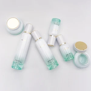 Custom Shiny White round Reusable Packaging Glass Bottles Flat Shape Cosmetics Cream Jars with Pump Sprayer for Eye Drop Use