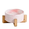 Pink ceramic with wooden frame