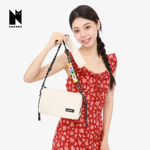 NOXXON Wholesale Fashion Waterproof Sling Nylon Cylinder Crossbody Bag for Men and Women Versatile Shoulder Pillow Bag