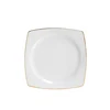 Assiette à bord doré