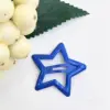 Clip estrella con gota de aceite de color, 3.2cm, azul zafiro.