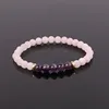 11. Quarzo rosa opaco + oro ametsyt