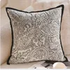 Motif ethnique foncé bord noir 45x45cm