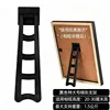 Large black trapezoidal stand