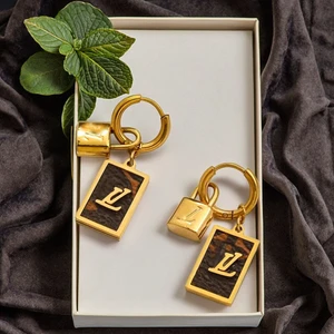 Hot-selling Brand Gold-plated Latest Designer Earrings, Stainless Steel Drop Earrings with Leather Overlay Craftsmanship