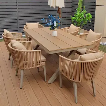 Outdoor Plastic Wood Garden Set Elegant Rattan Woven Chair and Leisure Dining Table for Villa Courtyard Open-Air Terrace Yard