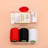 Red, black, and white thread [gift included with box]