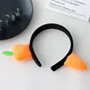 Carrot wearing hairband