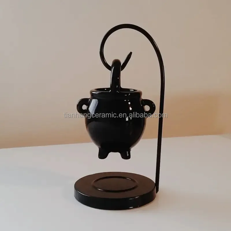 Wholesale Hanging Black Cauldron Shape Ceramic Oil Burner Ceramic Wax Melt Burner With Iron Shelf Aroma Wax Burner.jpg