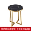 Table ronde en forme de pierre noire avec pied en V