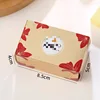 Caja de peonías con champán y chocolate.