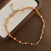 03-d8 Gold strawberry crystal beaded necklace