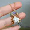 Golden purple zircon crab (natural pearl)