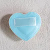 Blue heart-shaped cotton candy finger puff