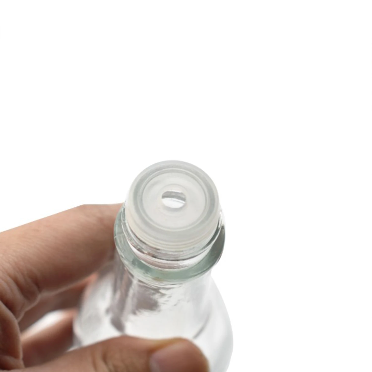 clear glass woozy bottles with shrink capsules