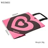 Pink paper bag