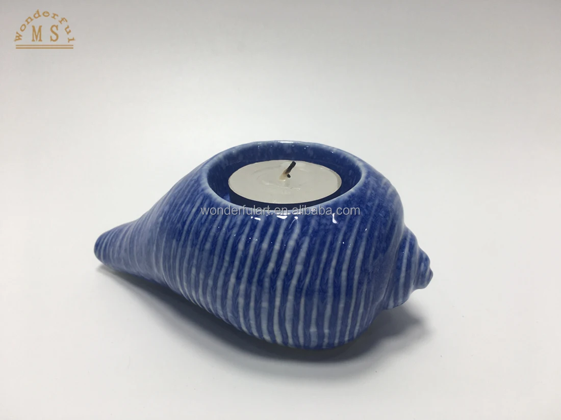 Factory price ocean style ceramic candle holder unique candle vessels blue sea snail fish shaped candle container