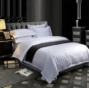 Hotel Simple Four Piece White Polyester Satin Pattern Bedding Set Includes Sheet Bed Cover Quilt Cover Pillow Core