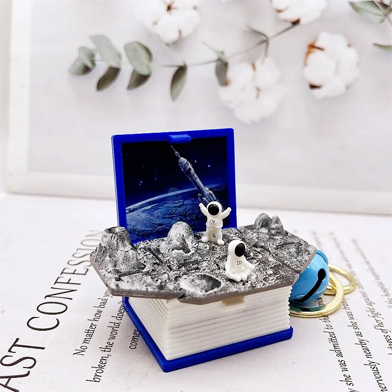 Factory Direct Novelty 3D Mini Book Key Chain Portable Folding Mini Surprise Exploding Books Toys Key Chain for Kids