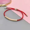 rose gold+red rope