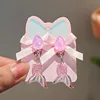 Ab glue pink fish tail ear clips