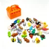 Boîte de rangement orange + 10 petits animaux
