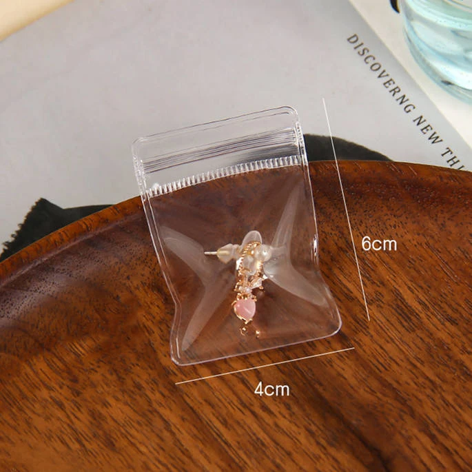 Professional jewelry pouch presentation solution Transparent bracelet packaging in retail display setting